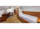 Bedroom featuring a bed with built-in drawers, as well as a wood desk at 2411 N County Road 500 W, Muncie, IN 47304