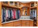 Spacious walk-in closet with plenty of built-in storage and a vanity at 2411 N County Road 500 W, Muncie, IN 47304
