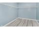 An empty walk-in closet with wire shelving and light blue walls at 2429 N Centennial St, Indianapolis, IN 46222