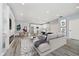 Open-concept layout combines the living room, dining area, and kitchen, creating a spacious and inviting atmosphere at 2429 N Centennial St, Indianapolis, IN 46222