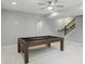 Basement featuring a pool table and staircase at 2485 Alexandra Dr, Carmel, IN 46074