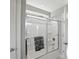 Well lit bathroom featuring sliding glass door shower with gray tiling and fixtures at 2485 Alexandra Dr, Carmel, IN 46074