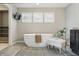 Bright and spacious bathroom with a freestanding tub, elegant fixtures, and a walk-in closet at 2485 Alexandra Dr, Carmel, IN 46074