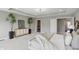 Comfortable main bedroom with carpet, walk-in closet, soft light, and neutral tones at 2485 Alexandra Dr, Carmel, IN 46074