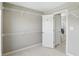 Walk-in closet with ample shelving and an open door leading into a bathroom at 2485 Alexandra Dr, Carmel, IN 46074