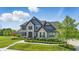 Well-maintained two-story home with a spacious lawn, offering curb appeal at 2485 Alexandra Dr, Carmel, IN 46074