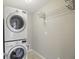 Cozy laundry room featuring a stacked washer and dryer at 2485 Alexandra Dr, Carmel, IN 46074