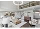 Spacious living room with a modern design, showcasing an open layout and a view of the second story at 2485 Alexandra Dr, Carmel, IN 46074