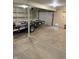 Unfinished basement space showing a door and a trailer, providing a sense of space at 258 Riverwood Dr, Noblesville, IN 46062