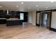 Bright kitchen with a wooden island, dark accents, and ample natural light, designed for comfortable living at 258 Riverwood Dr, Noblesville, IN 46062