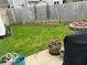 Backyard features a garden with raised garden bed and fire pit at 2637 Grand Fir Dr, Greenwood, IN 46143