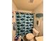 This bathroom features a shark themed shower curtain and nautical decor at 2637 Grand Fir Dr, Greenwood, IN 46143