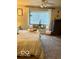 Relaxing bedroom featuring a window seat, decor, and neutral paint color at 2637 Grand Fir Dr, Greenwood, IN 46143
