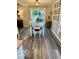 The dining room boasts wood-like flooring and a sliding door to the backyard at 2637 Grand Fir Dr, Greenwood, IN 46143