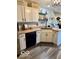 Well-maintained kitchen featuring white cabinets, modern appliances, and ample countertop space at 2637 Grand Fir Dr, Greenwood, IN 46143