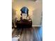 Intimate corner with a dark wood piano, artwork and dual lamps at 2637 Grand Fir Dr, Greenwood, IN 46143