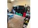 This living room features playful decor, TV, and storage units at 2637 Grand Fir Dr, Greenwood, IN 46143