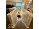 Carpeted staircase leads down to a living space, showcasing the home's layout at 2637 Grand Fir Dr, Greenwood, IN 46143