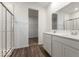 Bathroom features double vanity sinks with modern fixtures, shower with glass door, and a walk-in closet at 284 N Bur Oak Dr, Mooresville, IN 46158