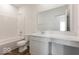 Clean, well-lit bathroom with tub-shower combo and a large vanity with ample counter space at 284 N Bur Oak Dr, Mooresville, IN 46158