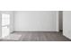 Bright bedroom featuring neutral carpet, crisp white walls, and natural light at 284 N Bur Oak Dr, Mooresville, IN 46158
