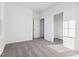 Bright bedroom with carpet flooring and natural light, featuring a walk in closet and window at 284 N Bur Oak Dr, Mooresville, IN 46158