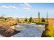 Outdoor fire pit area with stone benches, perfect for relaxing and entertaining at 284 N Bur Oak Dr, Mooresville, IN 46158