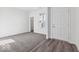 Welcoming foyer featuring a neutral color palette, a front door, and access to the rest of the house at 284 N Bur Oak Dr, Mooresville, IN 46158