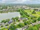 Stunning aerial view of lakeside homes with a city skyline backdrop at 2841 Tropical Dr, Indianapolis, IN 46205
