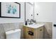 Modern bathroom featuring sleek vanity, toilet, and stylish decor at 2841 Tropical Dr, Indianapolis, IN 46205