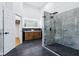 Luxury bathroom with tile shower and modern vanity with double sinks at 2841 Tropical Dr, Indianapolis, IN 46205