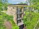 Striking view of a modern three-story home with balconies and sleek design at 2841 Tropical Dr, Indianapolis, IN 46205