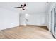 Spacious living room featuring recessed lighting, wood-look floors, and stairs to second level at 2841 Tropical Dr, Indianapolis, IN 46205