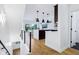 Contemporary interior highlighting the open floor plan, modern finishes, and natural light, with kitchen in the background at 2841 Tropical Dr, Indianapolis, IN 46205
