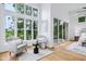 Sitting area offering serene views from large windows at 2841 Tropical Dr, Indianapolis, IN 46205