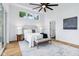 Comfortable main bedroom with ceiling fan and great natural light at 2841 Tropical Dr, Indianapolis, IN 46205