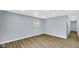 Minimalist bedroom with modern flooring, neutral paint and base molding at 3106 N Harding St, Indianapolis, IN 46208