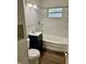 This bathroom features a sink with vanity, shower over tub and hardwood floor at 3325 Canaday Dr, Anderson, IN 46013