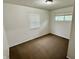 A simple bedroom with natural light showcases a quiet retreat at 3325 Canaday Dr, Anderson, IN 46013