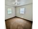 A simple bedroom with natural light showcases a cozy retreat at 3325 Canaday Dr, Anderson, IN 46013