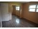 Bedroom featuring a large window and closet with mirror doors at 3612 Carolee Ct, Indianapolis, IN 46227