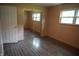 Bedroom featuring a large window and closet with mirror doors at 3612 Carolee Ct, Indianapolis, IN 46227