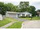 Charming single-story home with a well-maintained front yard and a two-car garage at 3612 Carolee Ct, Indianapolis, IN 46227
