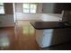 An open concept kitchen features a laminate floor and sink at 3612 Carolee Ct, Indianapolis, IN 46227
