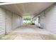 Spacious carport offers covered parking and protection from the elements, adding convenience to the property at 3801 N Vernon Dr, Muncie, IN 47304