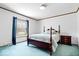 Comfortable bedroom with a large window letting in natural light and neutral-toned walls at 4244 Asbury St, Indianapolis, IN 46227