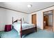 Comfortable bedroom featuring a large window letting in natural light, with ample closet space at 4244 Asbury St, Indianapolis, IN 46227