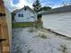 Cozy backyard featuring gravel area, grass, and a 