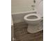 This bathroom is equipped with a toilet and an older style bathtub at 427 N Alton Ave, Indianapolis, IN 46222