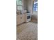 Updated kitchen featuring a stainless steel sink, a white gas range, and charming flooring, ideal for cooking at 427 N Alton Ave, Indianapolis, IN 46222
